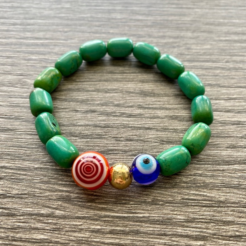 Women’s green magnesite and evil eye bracelet.  One size